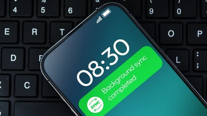 Aufkleber - Background synchronization completed notification on the smartphone screen, 4k footage close up. Device sync, data sharing.