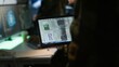 © DC Studio - Soldier in military HQ base using digital tablet to gather information on enemy troops. Close up shot of officer using software on device to do assessment of enemy vulnerabilities, camera A