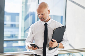 Aufkleber - Smartphone, businessman and notification in office for meeting, report and news or review. Communication, lawyer and documents or folder and technology for schedule, internet and online for email