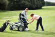 © Dean2000/peopleimages.com - Personal trainer, person with disability and people for golf in game, match and competition on golfing course. Recreation, sports and woman and man with club for training, fitness and field practice