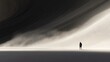 © alap - Silhouette figure stands in a dramatic desert landscape.