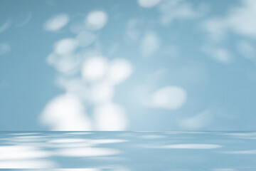 Fototapete - Wall interior background, studio and backdrops show products. with soft light shadow from window color blue and white. background for text insertion and presentation of product	
