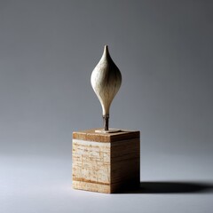 Poster - Minimalist Still Life: Stylized Bulb on a Wooden Cube, Subtle Lighting and Shadows Create an Artistic Composition.