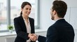 © Anaelle Compere - Business People Handshake in Office Meeting Setting