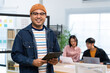 © BJ Day Stock - Asian business man start up working using laptop computer, marketing report with calculator document on table Planning to analyze financial reports Investing in an online business plan, e-commerce.