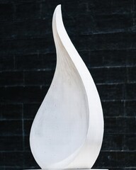 Poster - Elegant sculpture displayed on a table showcasing artistic craftsmanship and unique design elements