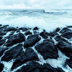 Poster - Powerful wave crashing against rocky shoreline creating splashes and white foam in the ocean