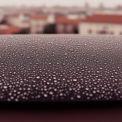 Poster - City skyline with raindrops on the window creating a beautiful urban scene with soft focus effect