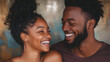 © Oksana - Young African-American couple laughing sincerely together on bright background