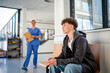 © Halfpoint - Teenage boy waiting alone in hospital waiting area before medical checkup.