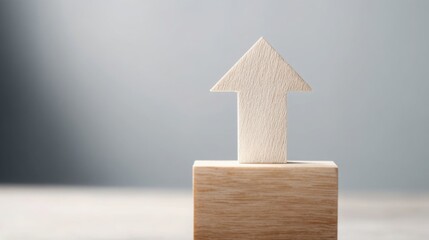 Poster - A wooden block supporting a small house on top indicating the advantage of early investment in real estate ventures