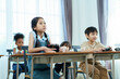© DG PhotoStock - Group of diverse children enjoy learning about the STEM.