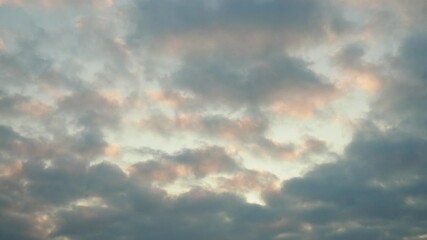 Poster - As the sun dips below the horizon, sky transforms into a vibrant canvas of colorful clouds. Hues of pink, orange, and yellow blend seamlessly, creating a breathtaking sunset that captivates the soul.
