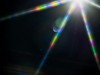 Wall Mural - eight point starlight on dark background. background for design and special effects.