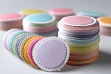 A set of pastel round sticker labels with curled edges, isolated on a diffrent collers or white background, perfect for labeling and decoration.