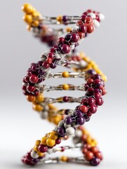 Poster - DNA double helix model for biology with colorful beads on a silver structure.