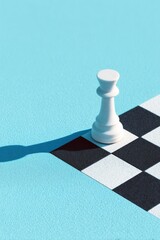 Poster - black-and-white checkerboard pattern set against vibrant blue background
