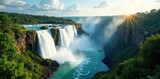 Majestic Zambezi River waterfall panorama; vibrant green surrounds , high angle, victoria falls