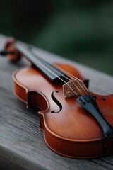 Poster - close-up of violin on wooden table captures elegance of classical music