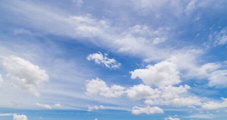 Wall Mural - clear blue sky background,clouds with background, blue sky background with tiny clouds. white fluffy