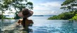 © lulu - Woman Relaxing Infinity Pool Ocean View