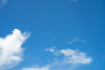 Wall Mural - blue sky with fluffy white cumulus clouds on bright sunny day, natural cloudscape background for env