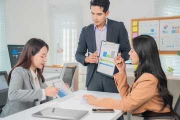 Poster - Business team analyzing financial charts and graphs during a meeting in a modern office, discussing company performance and making strategic decisions