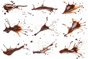Poster - Collection of chocolate liquid splashes and drops isolated against a white background surface