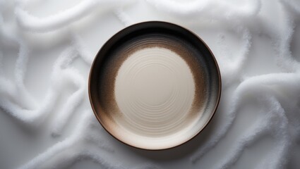 Poster - Top-down view of an empty ceramic round plate against a background