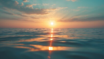 Poster - Reflections of the setting sun on the sea as it dips below the horizon