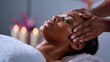 © Антон Сальников - A girl is receiving a massage and taking pleasure in aroma therapy at a spa