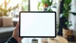 © Elevate - Bussines man holding iPad with blank screen