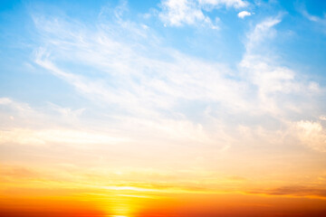 Wall Mural - beautiful , luxury soft gradient orange gold clouds and sunlight on the blue sky perfect for the bac