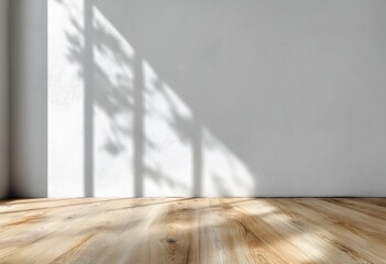 Poster - Sunlight casts soft shadows of plants on a white wall, illuminating a wooden floor in a minimalist, serene interior.