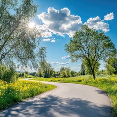 Aufkleber - Serene winding road through a radiant spring landscape bathed in golden sunlight among flowering meadows