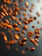 © Ketobox - Floating orange pills on gray background a focus shot providing concept of dietary supplements medicine and wellness