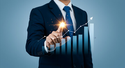 Poster - Businessman in Dark Blue Suit Pointing at Growth Chart with Arrow Up in Light Blue Background Showing Business Success