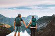 © EVERST - Romantic couple traveling in Norway man and woman friends hiking active vacations healthy lifestyle summer trip outdoor, family enjoying Lofoten islands mountains adventure tour bonding love together
