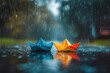 © Abdul - Colorful paper boats in a rainy puddle