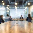 © EchoFrame - Modern conference room with blurred people meeting and smartphone on wooden table in foreground business setting for collaboration and technology integration