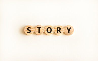 Fototapete - Story symbol. Concept word Story on beautiful wooden circles. Beautiful white table white background. Business lifestyle story concept. Copy space.