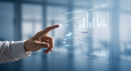 Poster - Hand Interacting with Digital Chart Display on Transparent Interface in Brightly Lit Office with Blurred Background