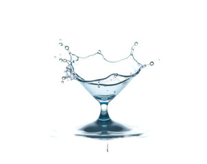 Poster - Captivating water splash in a diamond shaped glass showcases mesmerizing movement and crystal clear purity of liquid motion against the clean presentation