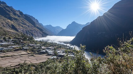 Poster - Serene mountain village enveloped in ethereal fog with sunlight filtering through valleys and illuminating the tranquil landscape