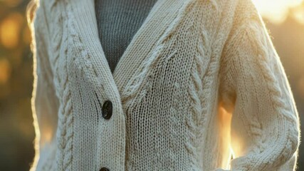 Poster - A clear view of someone's upper body dressed in a cozy sweater, great for illustrations about people, fashion, and lifestyle