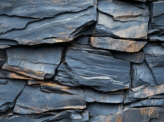 Poster - A close-up fragment of a mountain is set against a dark black grunge stone texture background, highlighting the rock texture