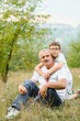 © Serhii - Happy grandfather embracing grandson in park