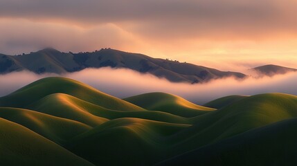 Wall Mural - a stunning view of a mountain range in the distance with low-lying clouds in the foreground and gent