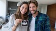 © Pinklife - A joyful couple proudly holds an ultrasound photo, capturing the anticipation and excitement of expecting their new baby, surrounded by warmth and happiness in their home.