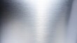 © Jeannaa - Brushed metallic surface with a smooth, reflective texture and horizontal grain pattern.